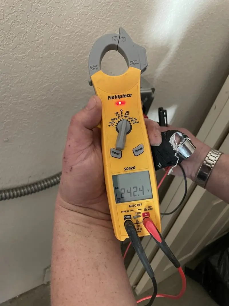 Voltage testing with clamp meter during Circuit Breaker Repair in Watauga